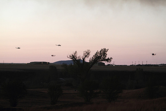 Pumpkin Time - As darkness approaches helicopters working the Wallow Fire Gather to land.