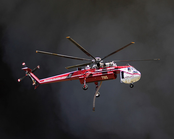 A Type 1 Helicopter passes in front of hte column near Greer