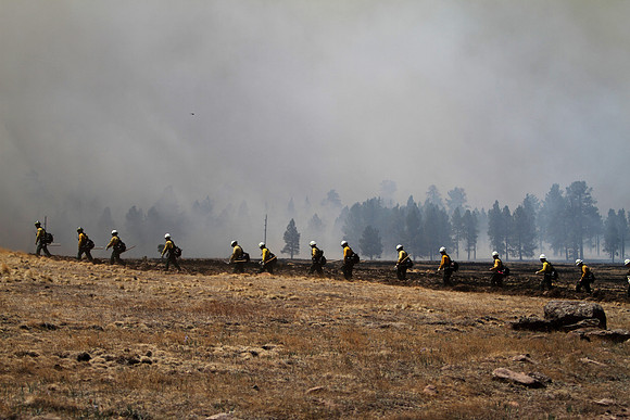 Crews move to hold the line above the West Fork of thee Little Colorado River.